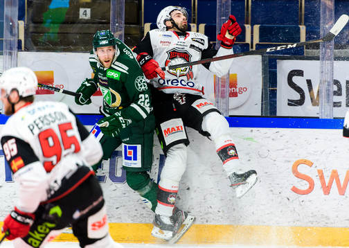 Färjestads Per Åslund och Malmö Redhawks Markus Lauridsen