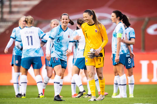 Tuva Hansen and goalkeeper Cecilie Fiskerstrand of Norway