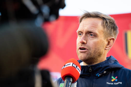 coach Martin Sjögren of Norway is being interviewed