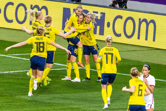 Lina Hurtig of Sweden celebrates with team mates