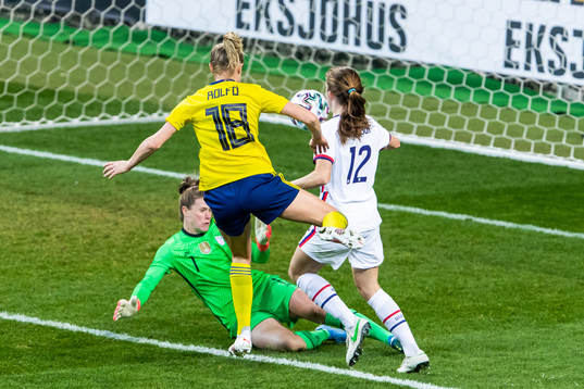 goalkeeper Alyssa Naeher and Tierna Davidson of USA against