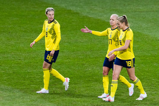 Lina Hurtig, Caroline Seger and Fridolina Rolfö of Sweden