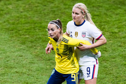 Kosovare Asllani of Sweden and Lindsey Horan of USA