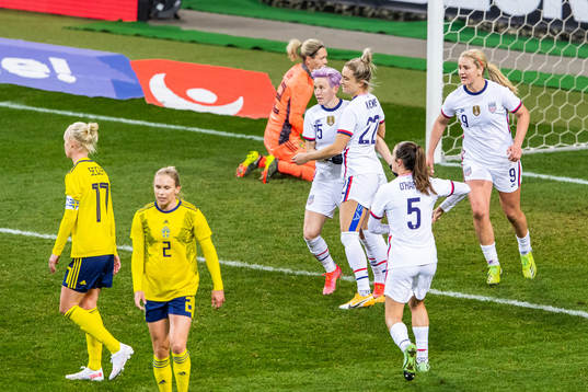 Megan Rapinoe of USA celebrates with Kristie Mewis