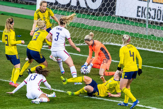 Goalkeeper Jennifer Falk of Sweden denies a goal for