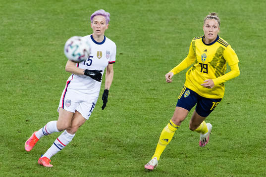 Megan Rapinoe of USA and Filippa Angeldahl of Sweden