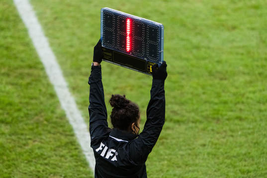 The fourth official shows 1 minute of added time the