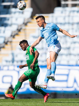 Hammarbys Akinkunmi Amoo och Malmö FFs Jonas Knudsen