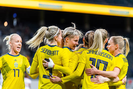 Lina Hurtig of Sweden celebrates with team mates
