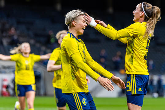 Lina Hurtig celebrates with Kosovare Asllani of Sweden