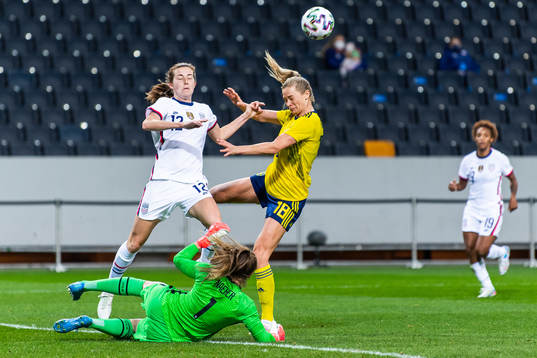 goalkeeper Alyssa Naeher and Tierna Davidson of USA against