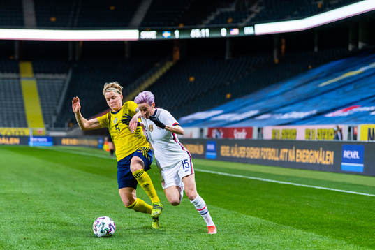 Nilla Fischer of Sweden and Megan Rapinoe of USA