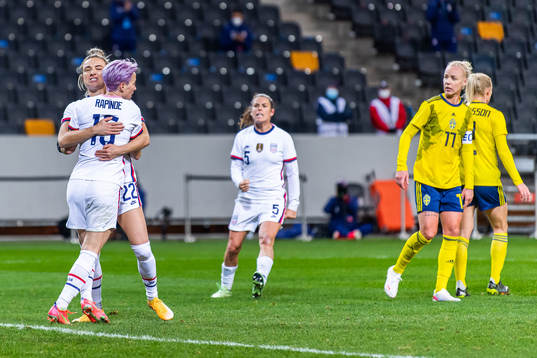 Megan Rapinoe of USA celebrates with team mates