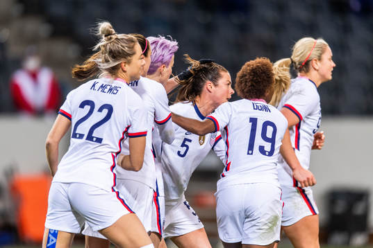 Megan Rapinoe of USA celebrates with team mates