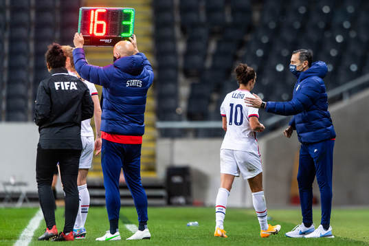 Carli Lloyd of USA is met by Vlatko Andonovski, head coach