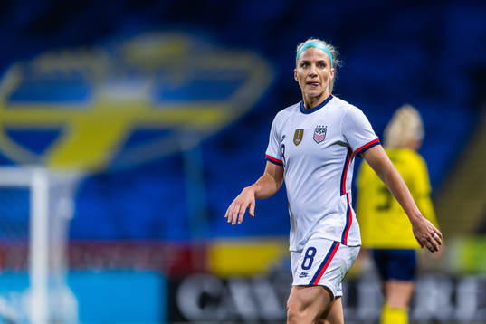 Julie Ertz of USA reacts against a call by the referee
