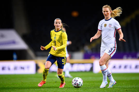 Kosovare Asllani of Sweden and Samantha Mewis of USA