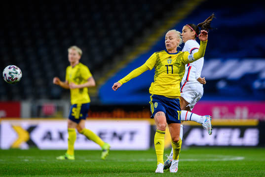 Caroline Seger of Sweden and Alex Morgan of USA