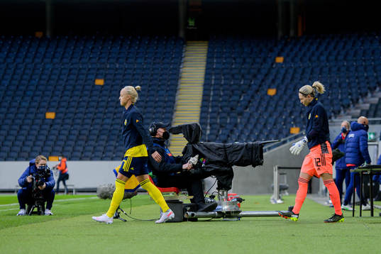 Caroline Seger and goalkeeper Jennifer Falk of Sweden