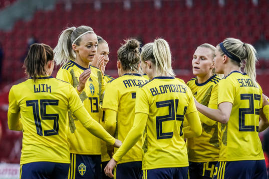 Amanda Ilestedt of Sweden celebrates with teammates