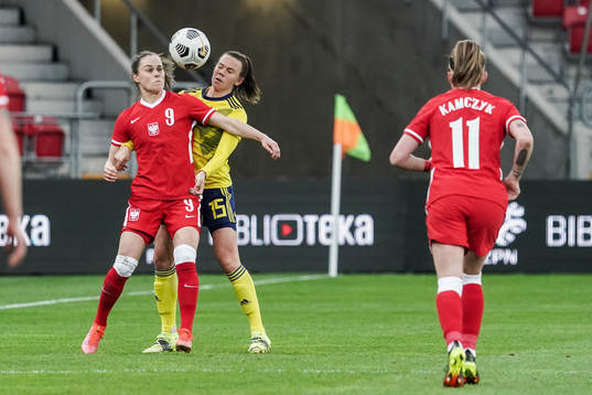 Ewa Pajor of Poland and Jessica Wik of Sweden
