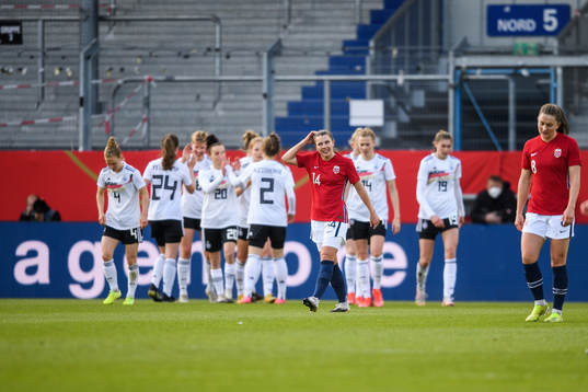 Cecilie Redisch Kvamme of Norway look dejected as the