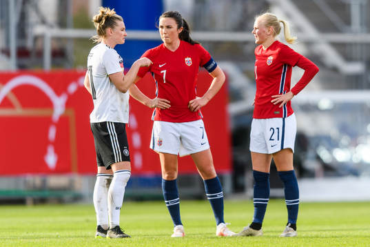 Alexandra Popp of Germany speaks with Ingrid Syrstad Engen