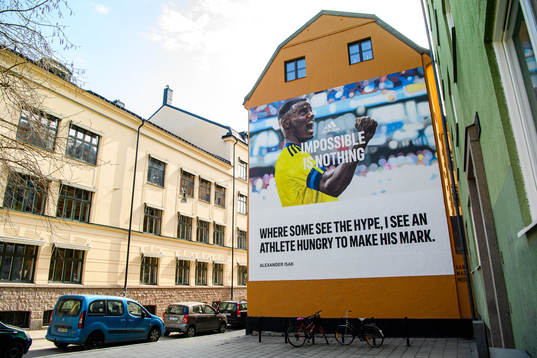 A hand painted billboard for Adidas of the Swedish football