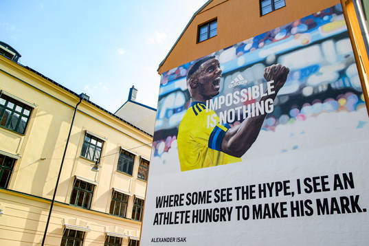 A hand painted billboard for Adidas of the Swedish football