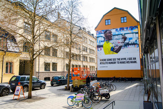 A hand painted billboard for Adidas of the Swedish football