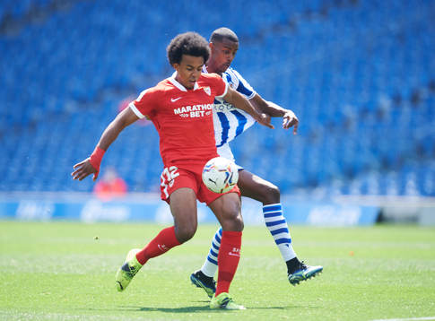 Alexander Isak of Real Sociedad duels for the ball with