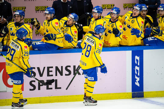 Jesper Frödén of Sweden celebrate with teammates