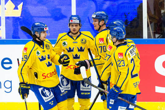 Dennis Rasmussen of Sweden celebrate with teammates