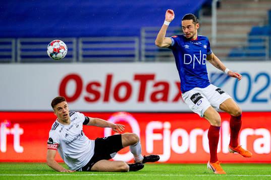 Markus Henriksen of Rosenborg and Amor Yonas Layoni of