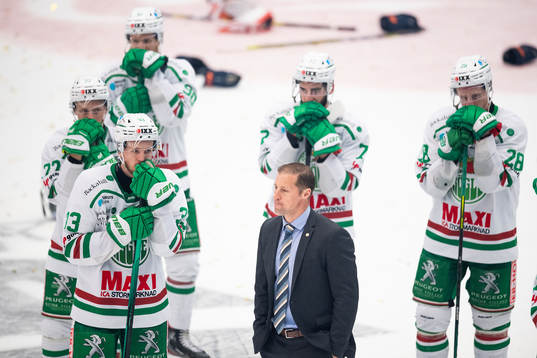 Rögles Niklas Hansson och tränare Cam Abbott deppar