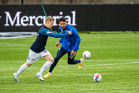Ola Brynhildsen and Ohikhuaeme Anthony Omoijuanfo of Molde