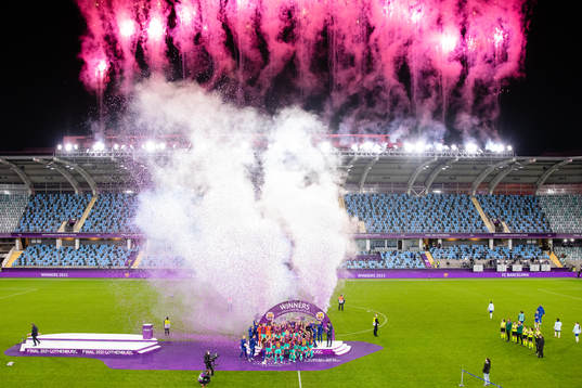 Barcelona celebrates with the trophy