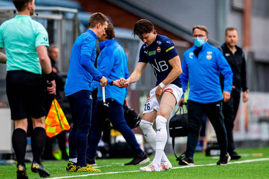 Lars-Christopher Vilsvik of Strømsgodset with an injury
