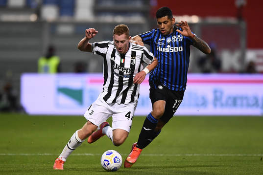 Dejan Kulusevski of Juventus and Cristian Romero of Atalanta