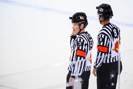Referee Tobias Björk and Mikael Nord
