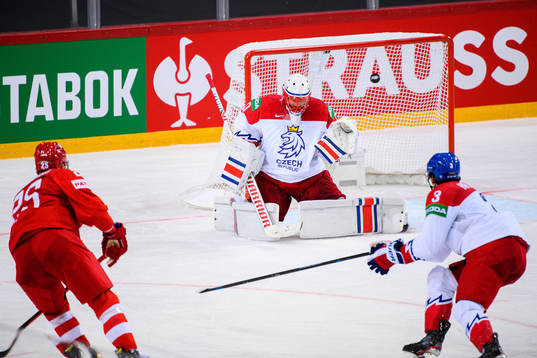 Mikhail Grigorenko of Russia  scores the 4-3 goal behind