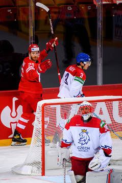 Mikhail Grigorenko of Russia celebrates the 4-3 goal behind