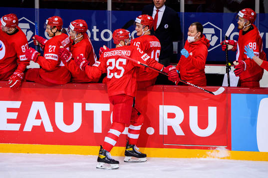 Mikhail Grigorenko of Russia celebrates the 4-3 goal