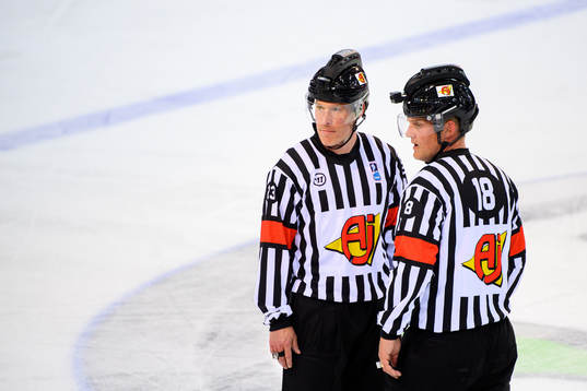 Referee Tobias Björk and Mikael Nord