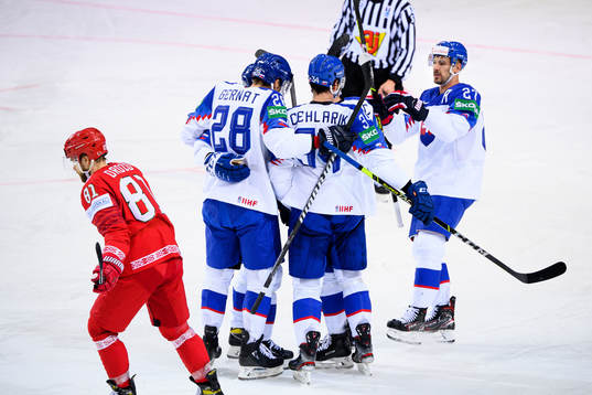Peter Cehlarik and Marek Hrivik of Slovakia celebrate the