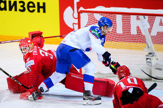 Marek Hrivik of Slovakia scores the 0-4 goal behind