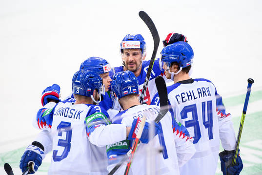 Marek Hrivik and Peter Cehlarik of Slovakia celebrate the