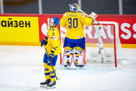 Adrian Kempe and goalkeeper Viktor Fasthof Sweden looks