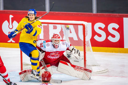 Marcus Sörensen of Sweden and goalkeeper Sebastian Dahm of