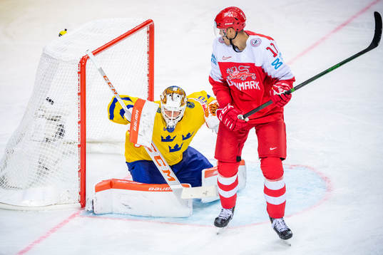 Nicklas Jensen of Denmark (not in pictures) scores 4-2